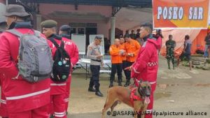 Rescue workers prepare for the operation at the site of a landslide that killed several people