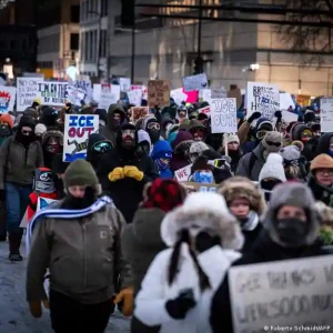 Protesters braved sub-zero temperatures on Friday to protest against ICE