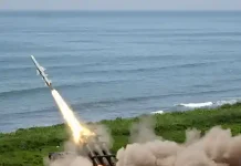 Japan loosens long-standing curbs on arms exports