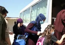 Australia says 13 IS-linked citizens to fly back from Syria