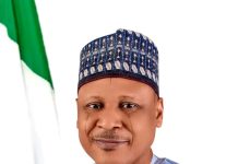 BON FELICITATES WITH INFO MINISTER MOHAMMED IDRIS AT 60