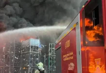 Russian strike on ammunition depot near Kyiv kills dozens
